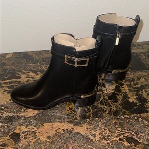 Calvin Klein Black Ankle Booties with Gold Accents
